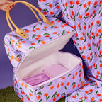 The Somewhere Co Cooler Bag in Sunburst being held open 