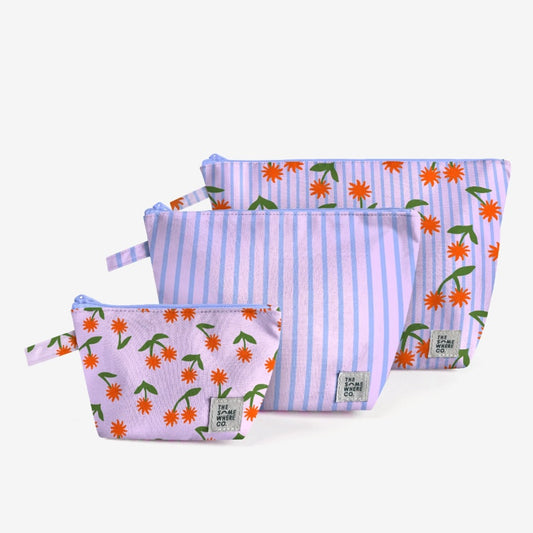 The Somewhere Co Handy Pouches in Sunburst on a grey background