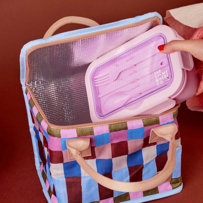 The Somewhere Co. Lunch Box in Hopstoch with box being put in it