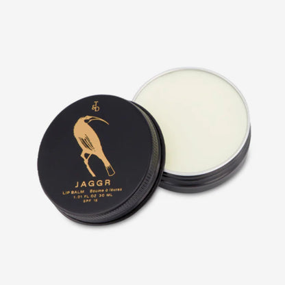 The Triumph & Disaster Jaggr Lip Balm open on a blank background