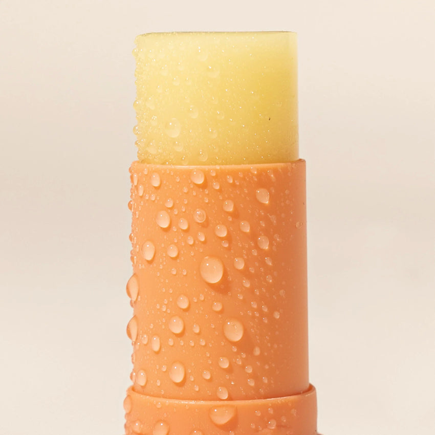 A closeup of the We Are Feel Good Inc Signature SPF50+ Lip Balm