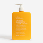 The We Are Feel Good Inc Tropical Sunscreen 400ml on a blank background