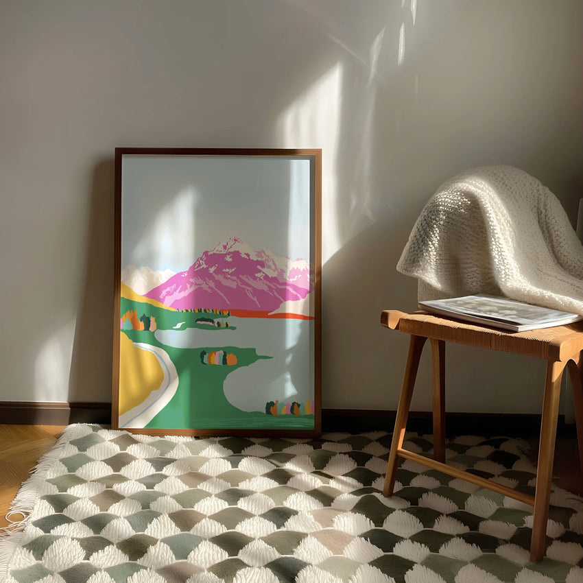 The West Moor Design Mount Cook Art Print in a wooden frame on a rug