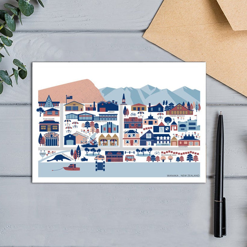 The Bridget Hall Wanaka Township Gift Card next to a pen and envelope