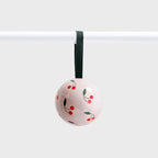 The Lettuce Cherries Bauble hanging on a rod