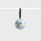 The Lettuce Lemons Bauble hanging on a rod