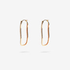 The Nina Gordon Fiasco Paved Hoops in Gold on a blank background