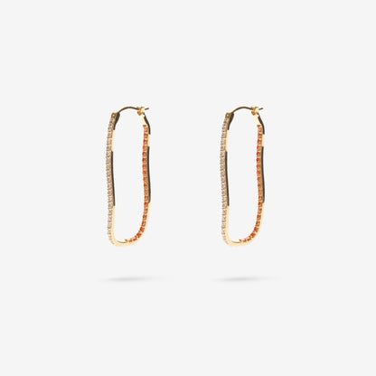 The Nina Gordon Fiasco Paved Hoops in Gold on a blank background