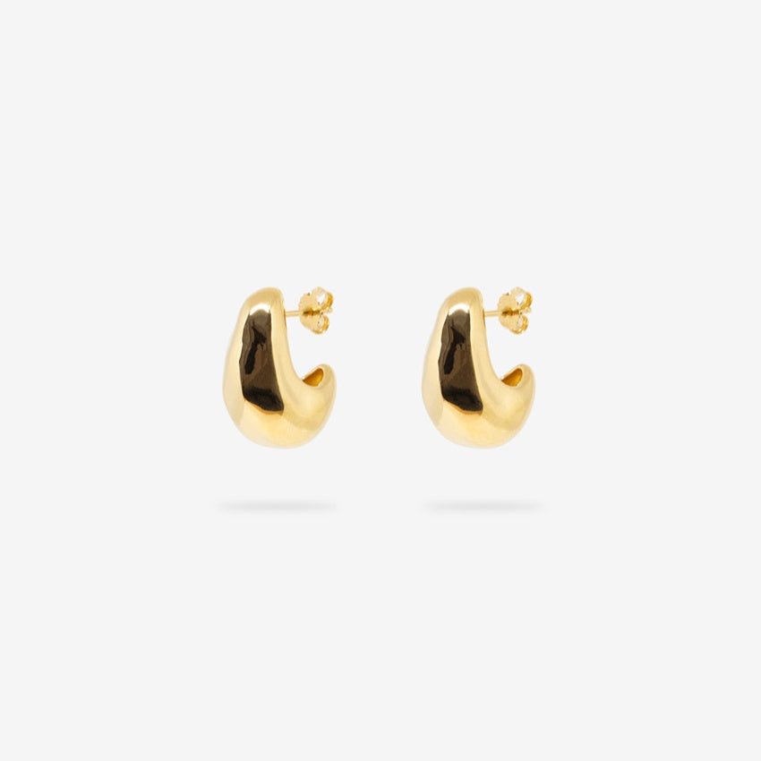 The Nina Gordon Volume Hoops in Gold on a blank background