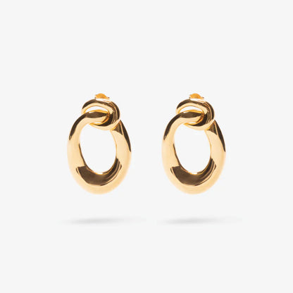 The Nina Gordon Voyage Door Knocker Earrings in Gold on a blank background
