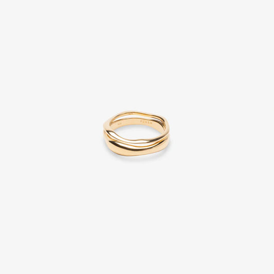 The Nina Gordon Waves Ring Set in Gold on a blank background