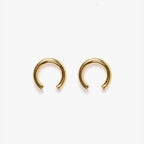 The Nina Gordon Isa Earrings in Gold on a blank background