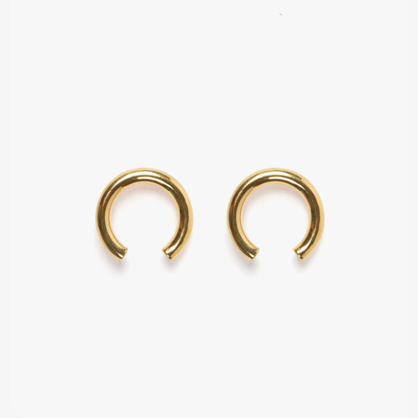 The Nina Gordon Isa Earrings in Gold on a blank background