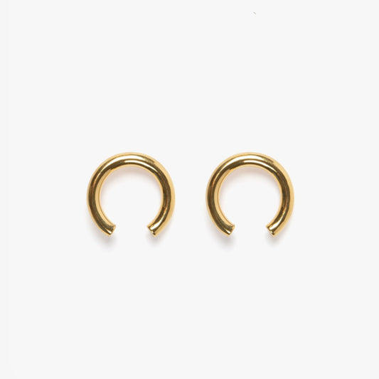 The Nina Gordon Isa Earrings in Gold on a blank background