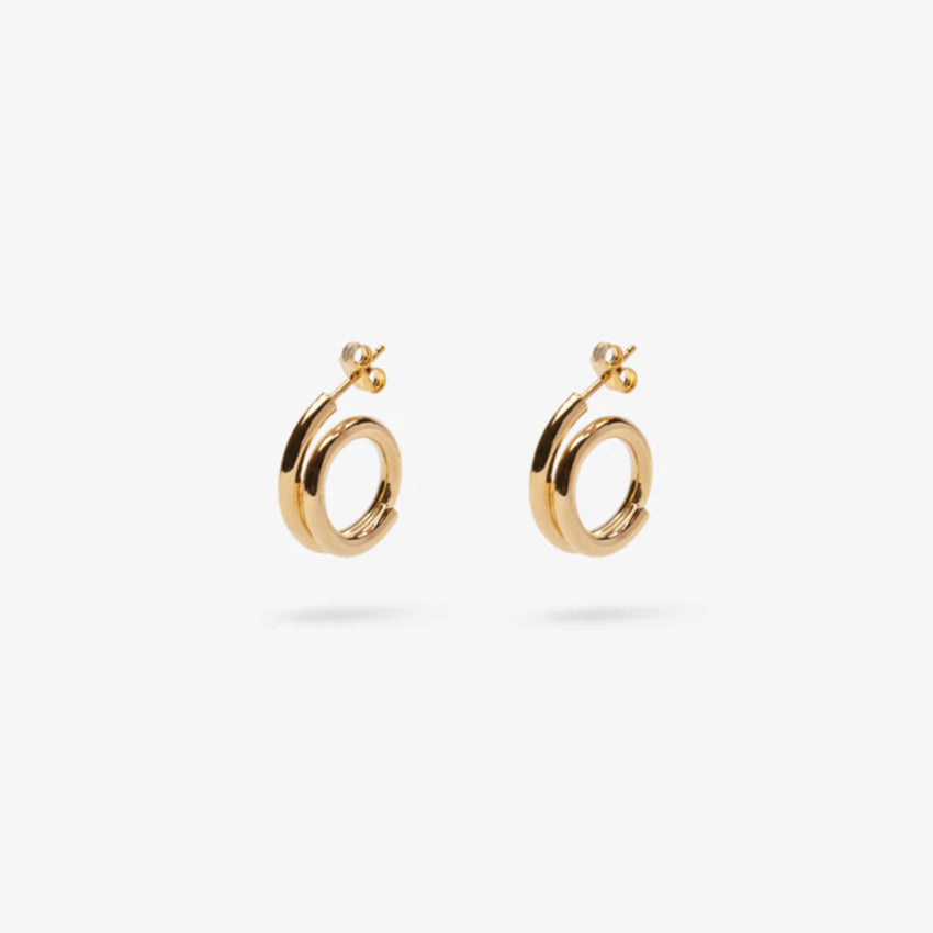 The Nina Gordon Venus Hoops Small in Gold on a blank background