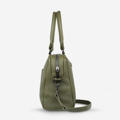 A side view of the Status Anxiety Last Mountains Bag in Khaki 