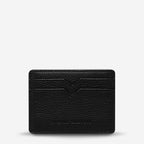 Status Anxiety Together For Now Wallet in Black on a blank background