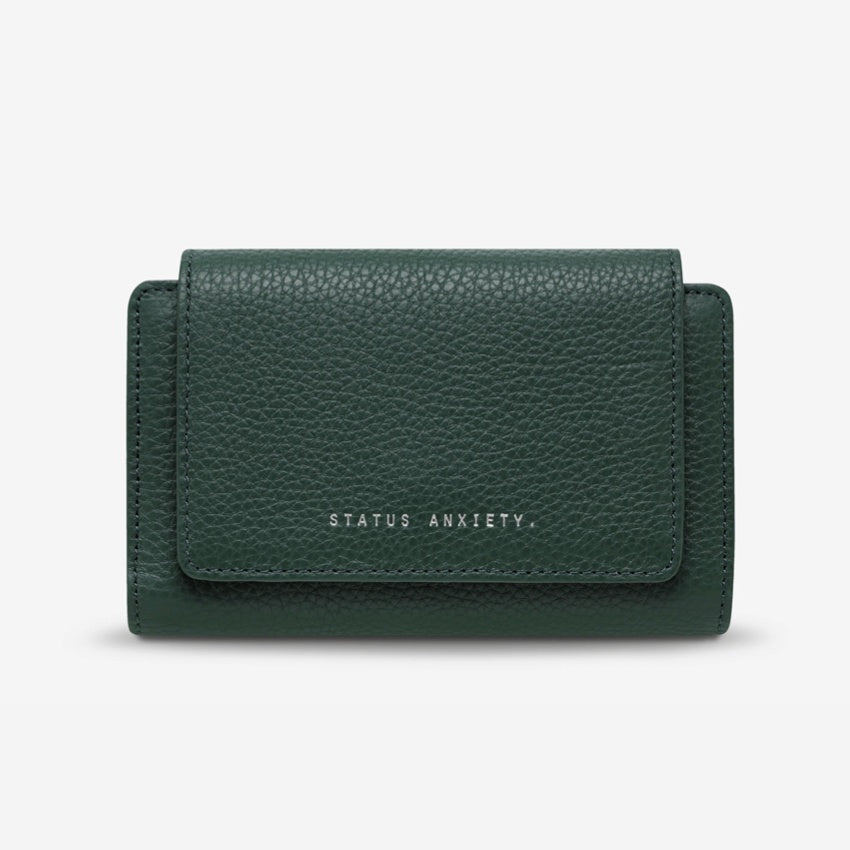 The Status Anxiety Visions Wallet in Teal on a blank background