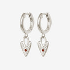 The Temple Of The Sun Lover Earrings in Silver on a blank background