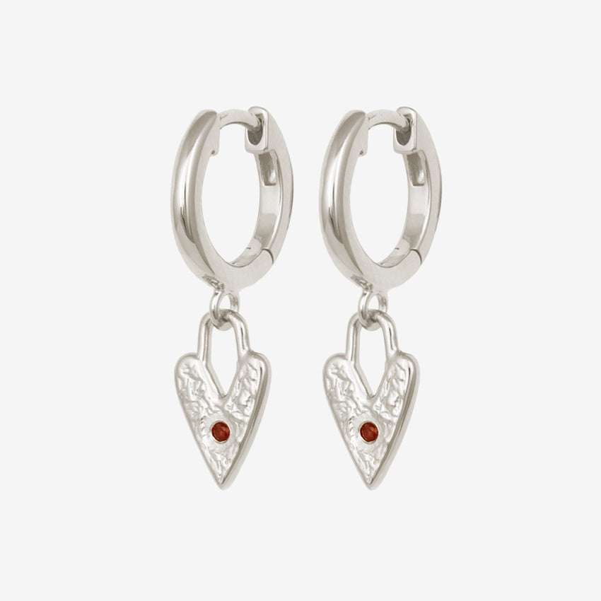 The Temple Of The Sun Lover Earrings in Silver on a blank background