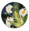 The Wolfkamp & Stone Placemat in Mt Cook Lily and Bee on a black background