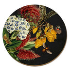 The Wolfkamp & Stone Placemat in Rata and Kowhai on a black background