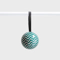 The Lettuce Zig Zag Bauble hanging on a rod
