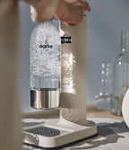 The Aarke PET Water Bottle being carbonated on the Carbonator 3