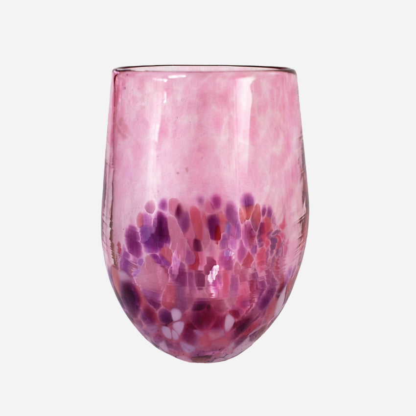The Amokura Tumbler Glass in Pink on a blank background