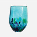 The Amokura Tumbler Glass in Bright Blue on a blank background