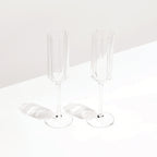 The Fazeek Wave Flute in Clear on a blank background