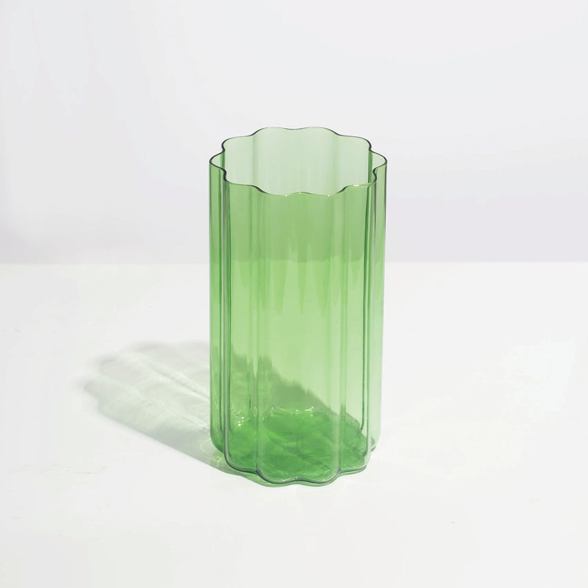 The Fazeek Wave Vase in Green on a blank background