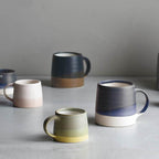 Kinto Slow Style Mug Mini photographed with the bigger Slow Style Mugs