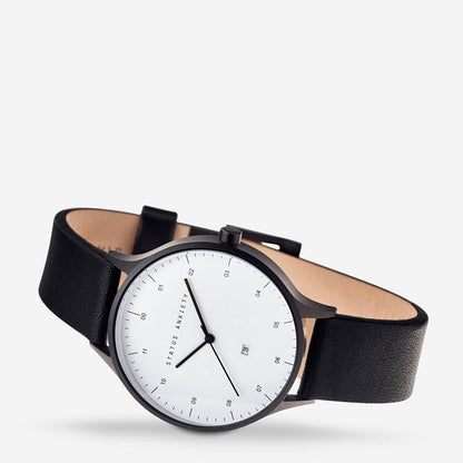 Status Anxiety Inertia Watch in Matte Black with White Face and Black Strap Side View