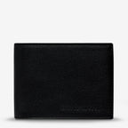 The Status Anxiety Noah Wallet in Black on a blank background