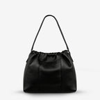 The back of the Status Anxiety Point Of No Return Bag in Black on a blank background