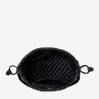 A top view of the inside of the Status Anxiety Point Of No Return Bag in Black on a blank background