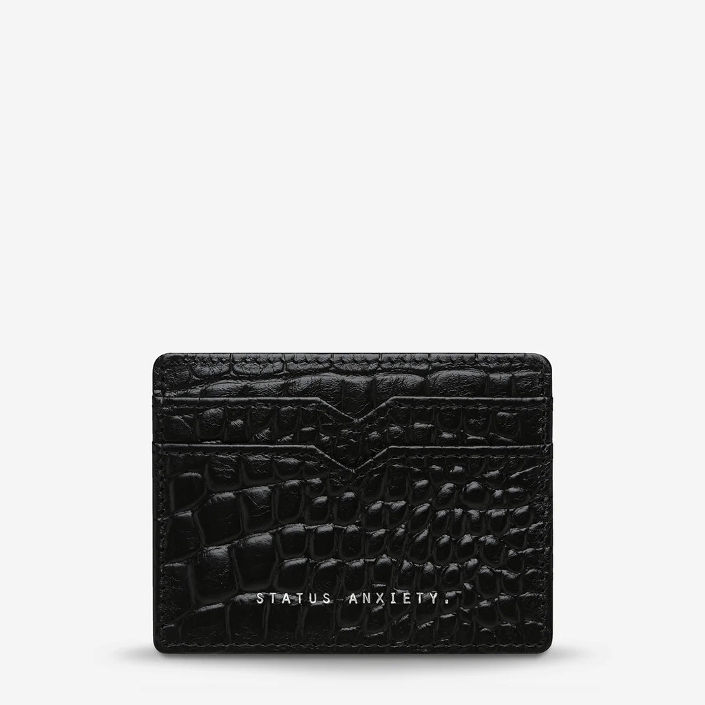 The Status Anxiety Together For Now Wallet in Black Pebble on a blank background