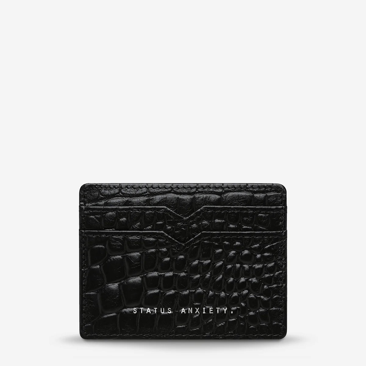 The Status Anxiety Together For Now Wallet in Black Pebble on a blank background