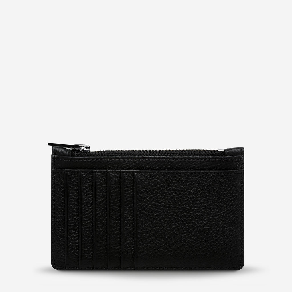 The Status Anxiety Avoiding Things Wallet in Black on a blank background