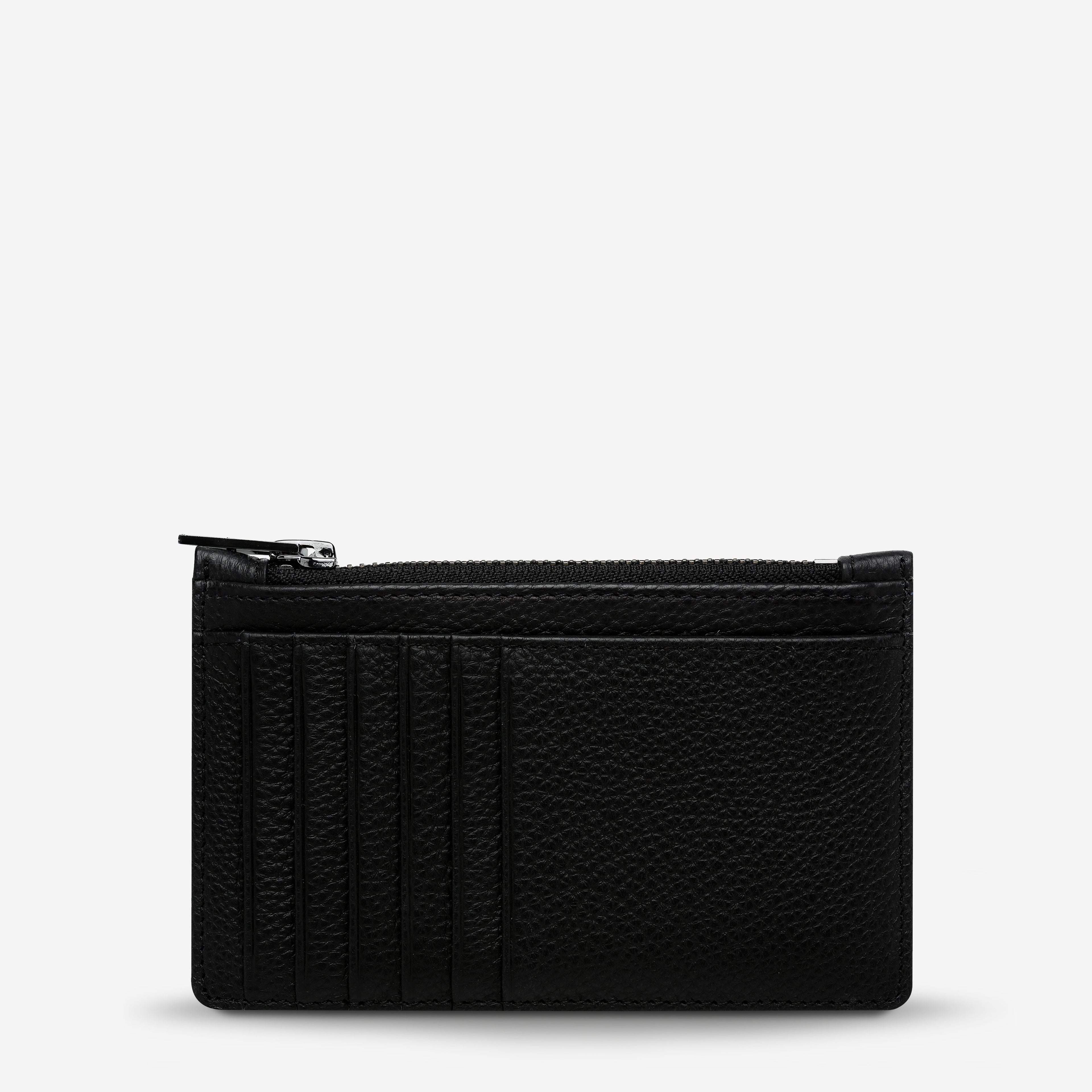 The Status Anxiety Avoiding Things Wallet in Black on a blank background
