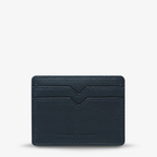 Status Anxiety Together For Now Wallet in Navy Blue on a blank background