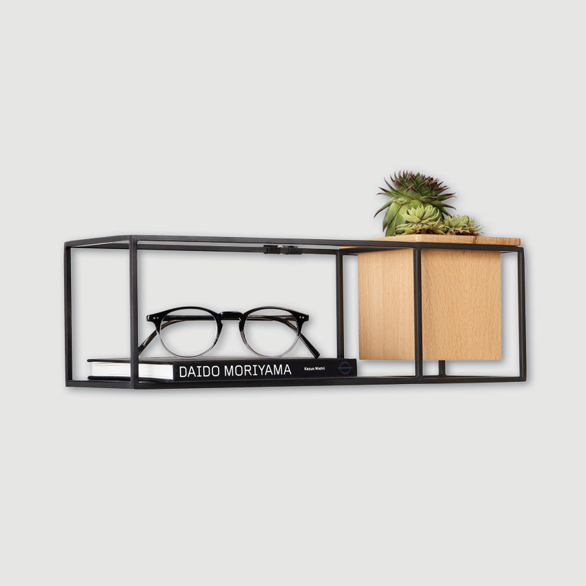 Umbra Cubist Shelf with items on it